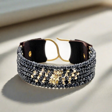 Our beautiful, layered bracelet in titanium-coated spinel.